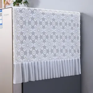 White lace refrigerator dust cover with floral daisy pattern and elegant pleated edge.