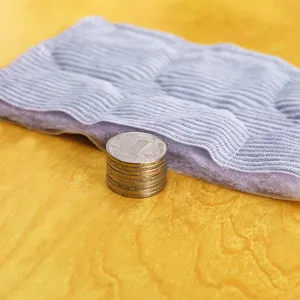 Thickened quilted bed headboard cover protector, soft padding detail view for bedroom.