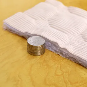 Thickened quilted headboard cover padding detail view showing premium inner filling material.