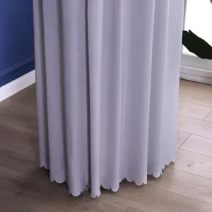 Upright air conditioner dust cover, greyish purple fabric with scalloped hem detail.