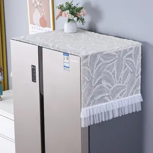 White lace refrigerator top cover dustproof cloth with elegant leaf pattern and ruffle edge.