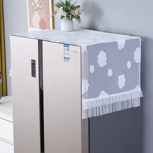 White lace refrigerator dust cover with cute cloud pattern and elegant tassel fringe for home decor.