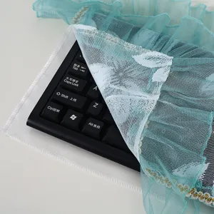 Lace mesh computer keyboard dust cover, breathable teal protective cover for desktop setup.