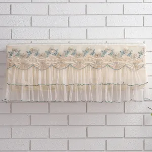 Detailed view of beige lace embroidery hanging air conditioner dust cover and wind curtain.