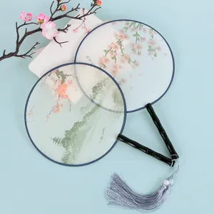 Traditional Chinese round fan transparent hanfu dancing prop with wooden handle tassels.
