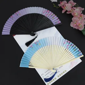 Chinese style folding hand fan with floral pattern and tassel, perfect for dance and hanfu outfit.