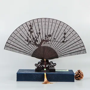 Traditional 7-inch ebony sandalwood folding fan, Chinese hollow carved design with gift box.