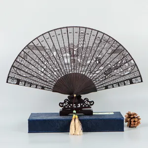 Chinese style ebony hollow carved folding fan with stand and gift box for traditional decor.