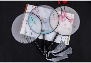 Translucent Chinese style round fan with wooden handle and tassels for Hanfu and dance.