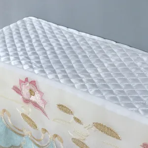 Quilted wall-mounted air conditioner dust cover with delicate floral embroidery design.