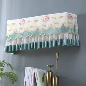 Wall-mounted air conditioner dust cover with lace embroidery and ruffled fringe design.