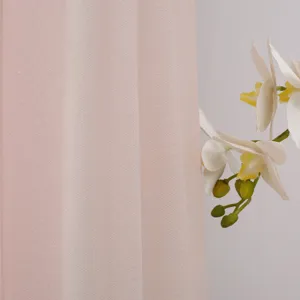 Primo piano dettagliato del tessuto antipolvere rosa texturizzato per condizionatore.