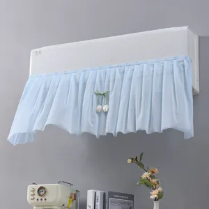 Detailed view of the cute blue mesh air conditioner wind shield curtain with tulip decor.