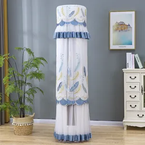 Elegant embroidered feather standing air conditioner dust cover detail view in cozy living room.