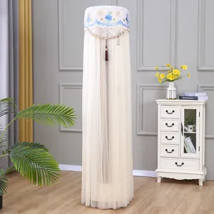 Detail view of the cylindrical vertical air conditioner dust cover with delicate lace embroidery.