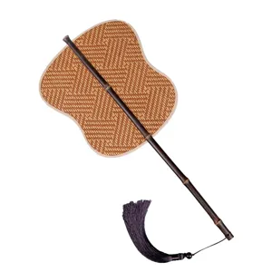 Traditional Chinese woven hand fan with dark bamboo handle and tassel for summer cooling.