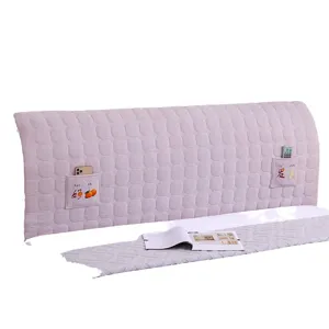 Thickened quilted headboard cover dustproof elastic bed head protector with side storage pockets.