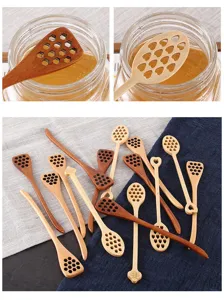 Natural wooden honey dipper spoons with cute honeycomb and heart patterns for daily use.