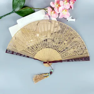 Chinese style hollow carved sandalwood folding fan with tassel exquisite craft gift item