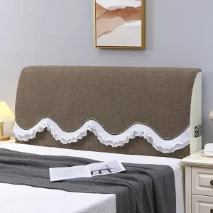 Brown plush headboard cover with white ruffled lace edge, dustproof stretch bedroom protector.