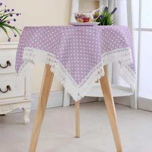 Purple polka dot tablecloth with delicate lace trim for home dining table decor style.