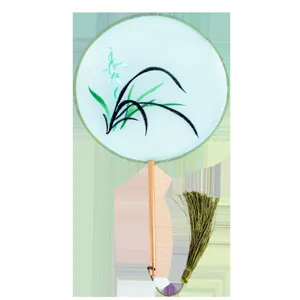 Traditional Chinese embroidered round fan with wooden handle and tassel for summer dance.