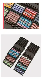 Detailed view of Japanese style wooden chopstick gift box set with colorful patterns.