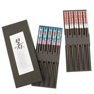 Japanese wooden chopstick gift set with fish and cherry blossom patterns, 5 pairs per box.