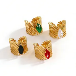 Stainless steel gold plated marquise cubic zirconia feather adjustable ring set of four.