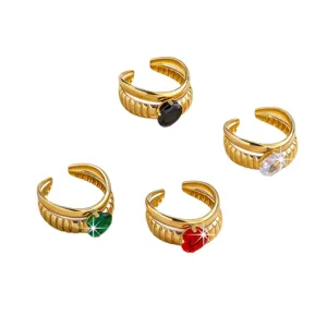 Stainless steel gold-plated open rings detailed view featuring sparkling colorful zircon stones.