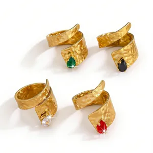 Detailed view of French vintage stainless steel hammered open rings featuring colorful teardrop zirconia.