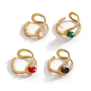 Detail shot of French retro stainless steel open rings with vibrant colored zirconia stones.