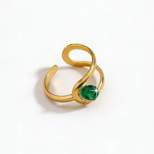 Detail shot of the French vintage green zircon open ring, showcasing the flowing gold band design.
