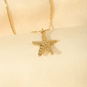Goldene Seestern Anhänger Halskette mit filigraner Kette für Damen und Mädchen.