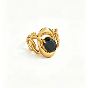 Detailed view of the gold-tone openwork stainless ring featuring a black faceted oval zircon stone.