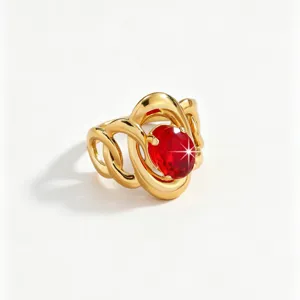 Close-up detail of a gold intertwined ring featuring a sparkling oval red zirconia.