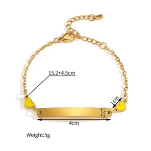 Stainless steel curved ID bracelet with yellow enamel hearts, engravable detail view.
