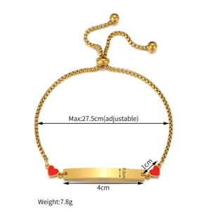 Gold stainless steel adjustable bracelet with red heart charms and blank engraving bar.