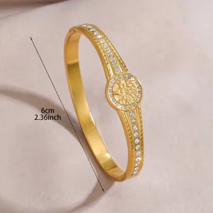 Gold stainless steel rhinestone hinged bangle bracelet with geometric center detail 6cm