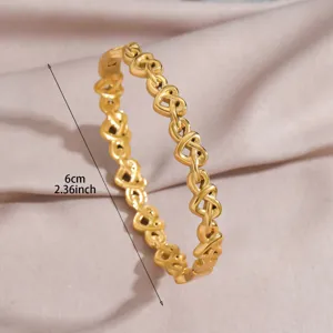 Gold plated stainless steel interlocking heart bangle bracelet fashion jewelry item