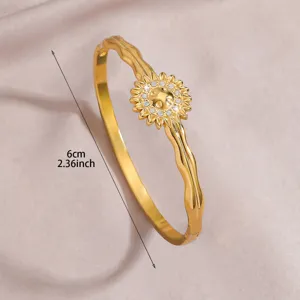 Gold plated stainless steel sunflower cuff bracelet detail shot showing crystal stones and size.