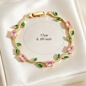 Exquisite gold-plated zircon bracelet featuring pink and green floral vine design details.