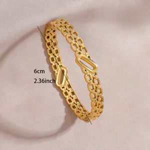 Gold stainless steel double layer hollow geometric fashion bangle bracelet for women daily wear.