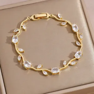 Exquisite gold-plated vine bracelet with sparkling zircon stones, elegant jewelry detail shot.