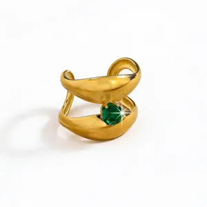 Gold plated brass double band ring featuring a sparkling green zirconia gemstone detail.