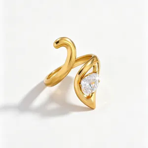 Gold plated stainless steel ring detailed close-up featuring sparkling pear zircon stone.