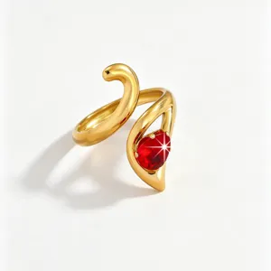 Close-up detail of a stylish 18k gold plated stainless steel red cubic zirconia ring.