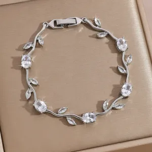 Exquisite silver zircon leaf bracelet, elegant vine design wrist chain for women jewelry detail.