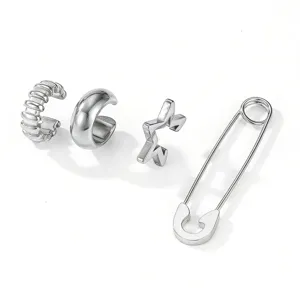 Détail de manchette d'oreille géométrique en acier inoxydable et boucles d'oreilles.