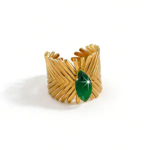 Gold-plated stainless steel statement ring featuring marquise green zircon stone